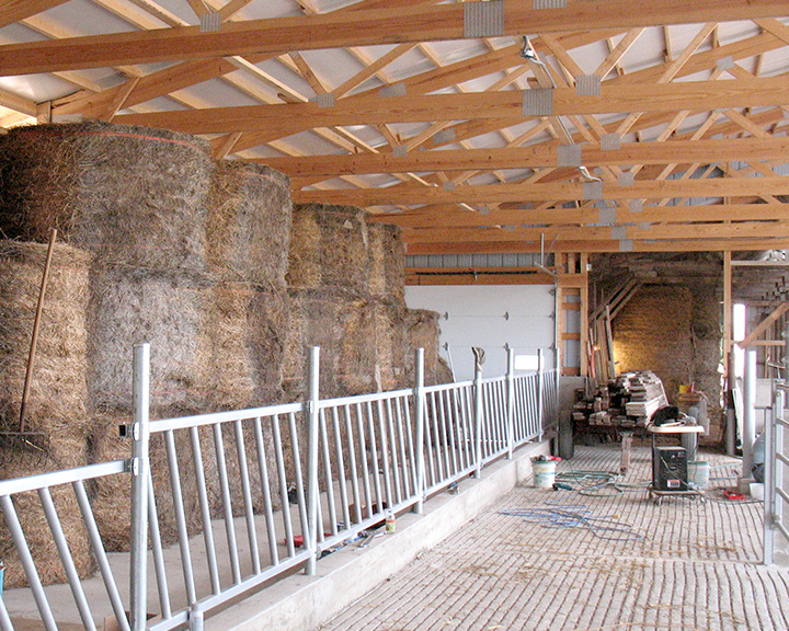 Interior of Cattle Barn Storing Hay Bails