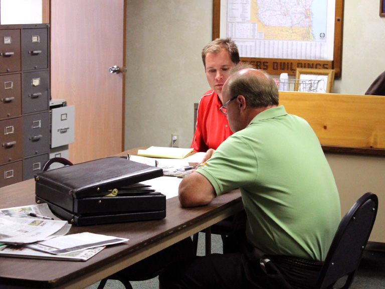 Two Employees Working on Final Design