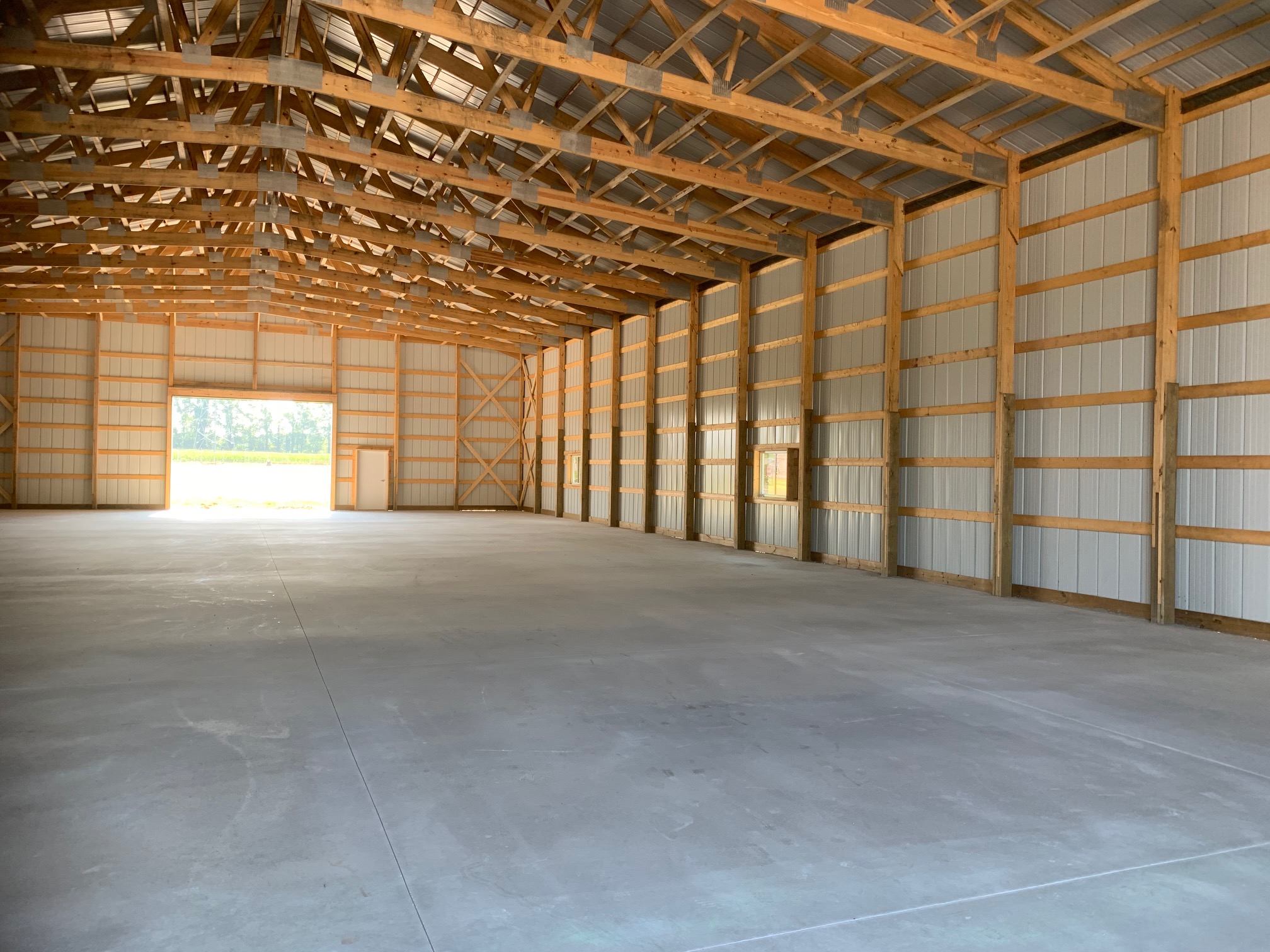 Truss and columns on a large post frame building