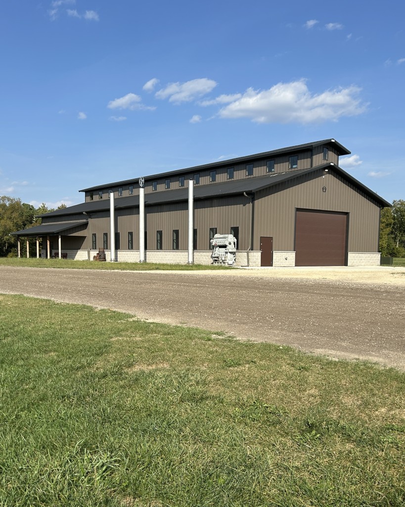 Baer Powerhouse at Rock River Thresheree, a 48′ × 124′ monitor-style commercial post-frame building in Edgerton, Wisconsin, built by Walters Buildings.