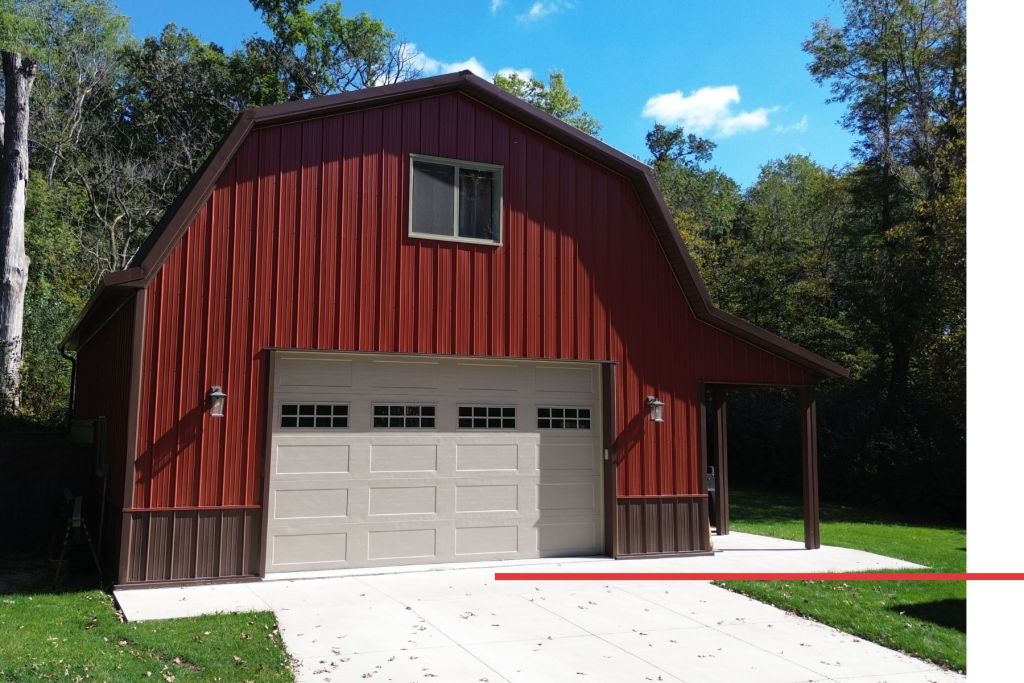 18′ x 10′ Overhead Door on Post-Frame Garage 30' x 40' post-frame pole barn garage with an 18' x 10' overhead door, red steel siding and a gambrel roof