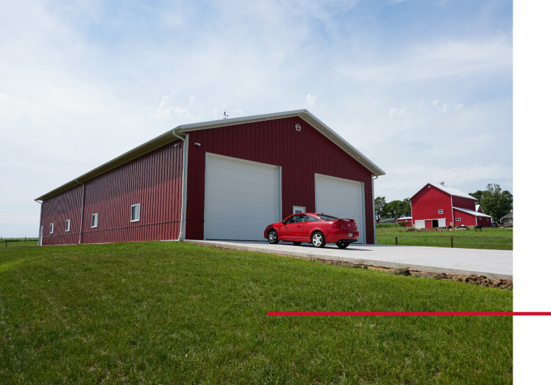 Front View of the Pole Barn Showing Dual Overhead Doors Front View of the Pole Barn Showing Dual Overhead Doors