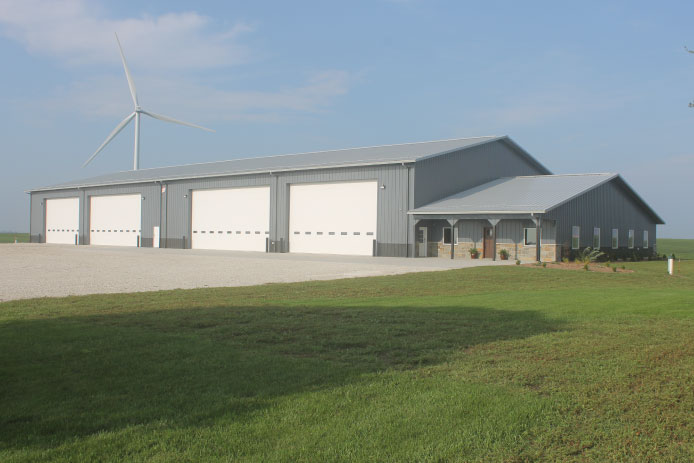 Exterior Showing 4 Large Overhead Doors & Front Porch Exterior Showing 4 Large Overhead Doors & Front Porch