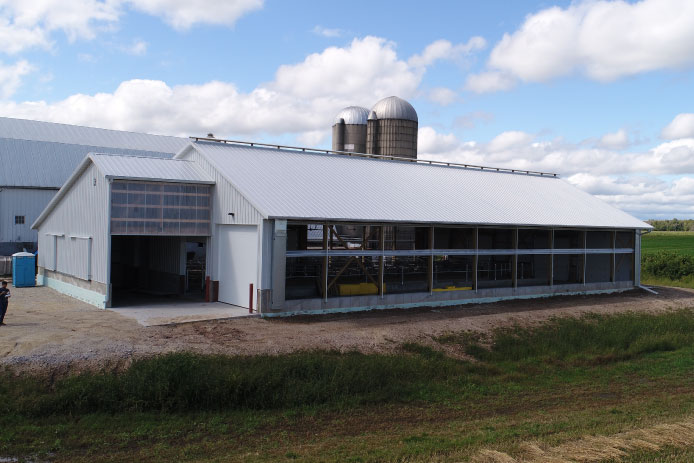 Open areas along the sides of the barn promote natural airflow Open areas along the sides of the barn promote natural airflow