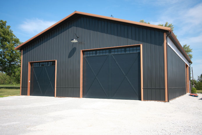 Distinct Steel Exterior and Dual Overhead Doors Distinct Steel Exterior and Dual Overhead Doors