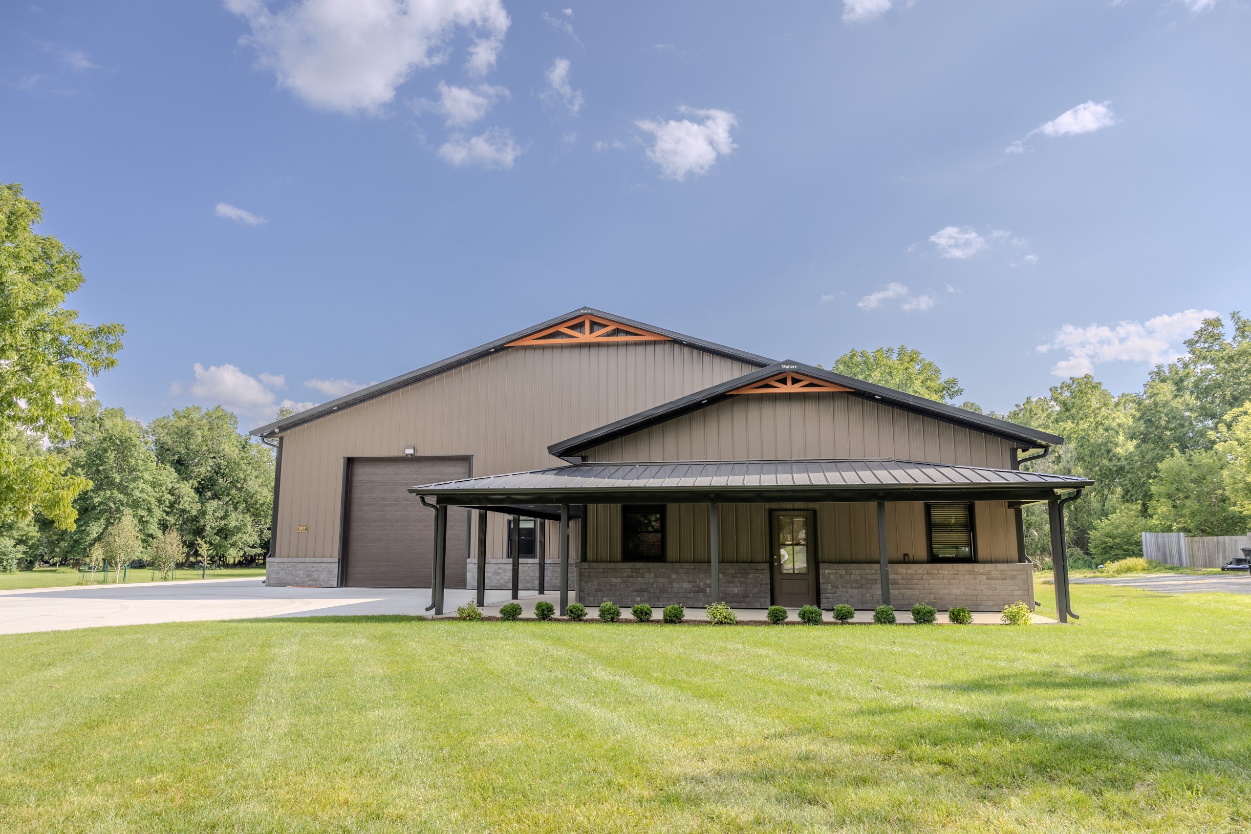 Exterior of a luxury car collector garage and private clubhouse built by Walters Buildings in Delavan, Wisconsin.