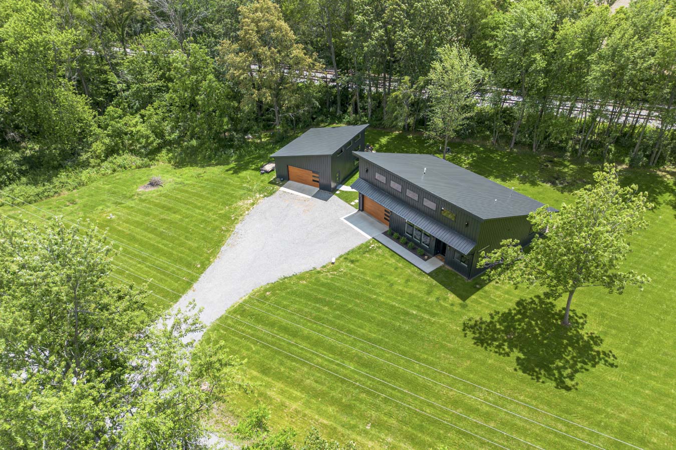 Aerial View of Black Post Frame Home